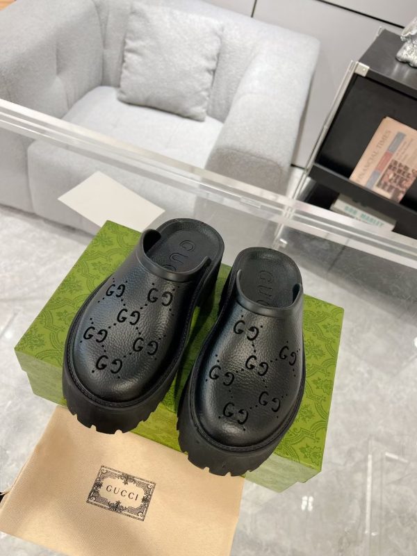 Gucci GG Slides perforated carved shoes black