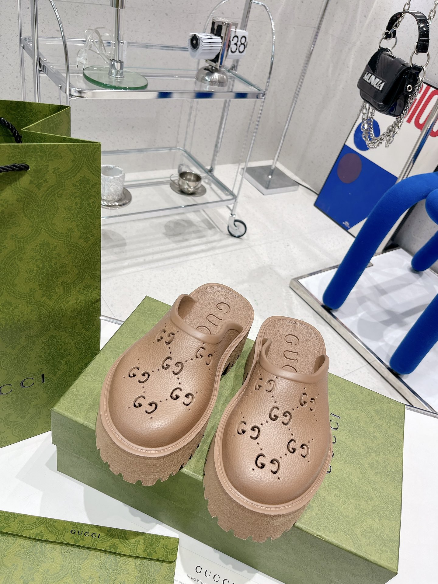 Gucci GG Slides perforated carved shoes F