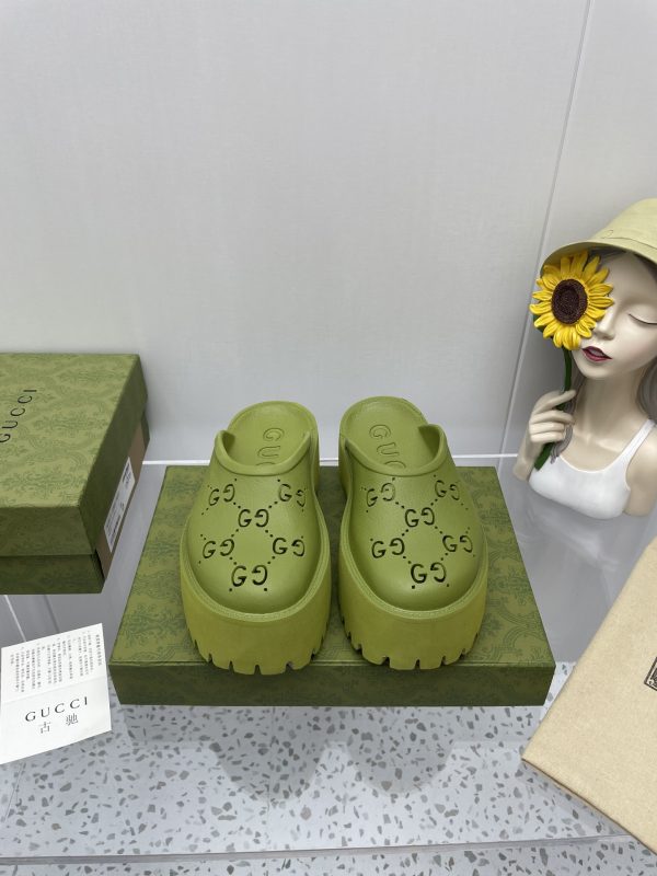 Gucci GG Slides perforated carved shoes green